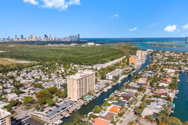 drone / aerial view with a view of city and a water view