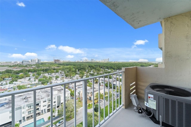 balcony with central AC and a city view