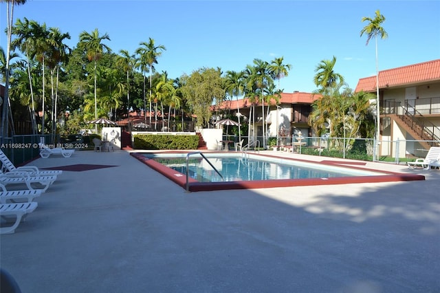 view of swimming pool featuring a patio