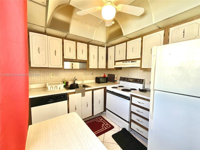 kitchen featuring ceiling fan, sink, white appliances, decorative backsplash, and light tile patterned floors