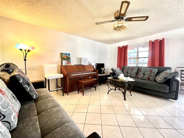 tiled living room featuring a textured ceiling and ceiling fan