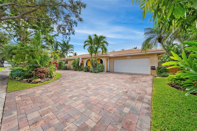 view of front of home with a garage