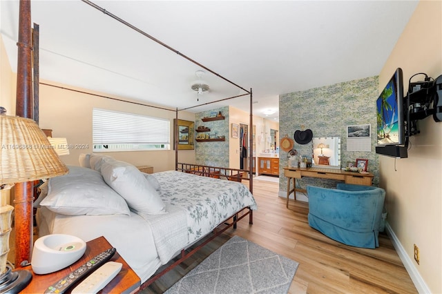 bedroom with wood-type flooring