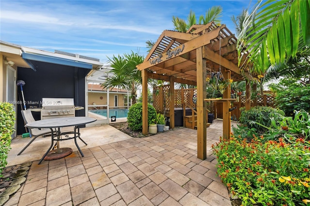 view of patio / terrace featuring a pergola and grilling area