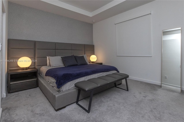 bedroom featuring light colored carpet