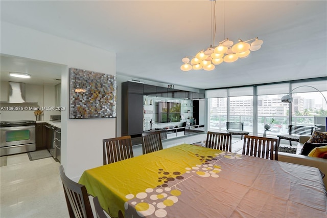 dining space with a wall of windows