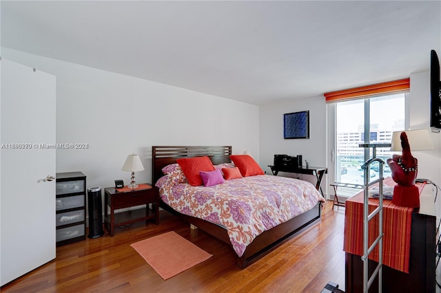 bedroom featuring hardwood / wood-style flooring