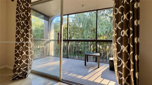 unfurnished sunroom featuring plenty of natural light