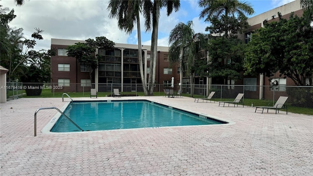 7060 Nova Dr Unit 306C, Davie, FL 33317 - community pool with a patio area