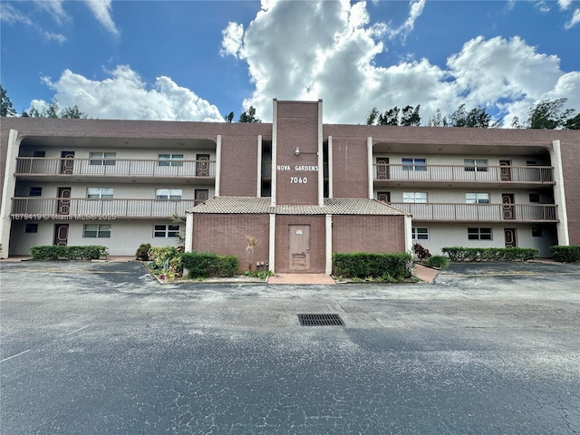 7060 Nova Dr Unit 306C, Davie, FL 33317 - view of apartment building / complex with uncovered parking