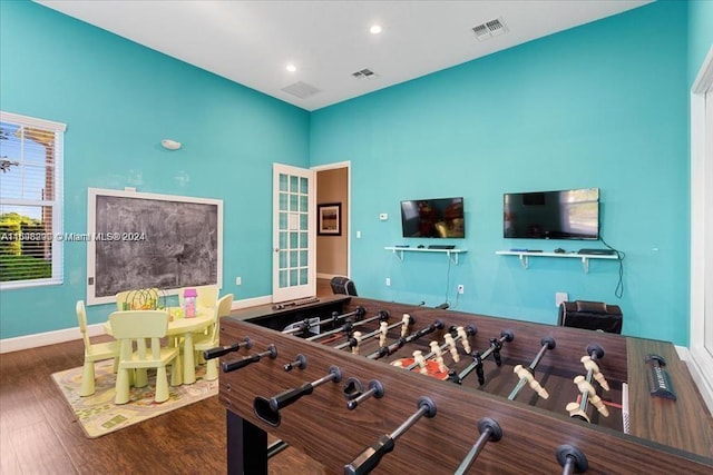 playroom with hardwood / wood-style flooring