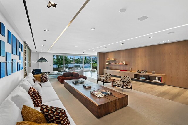 interior space featuring hardwood / wood-style flooring and a towering ceiling