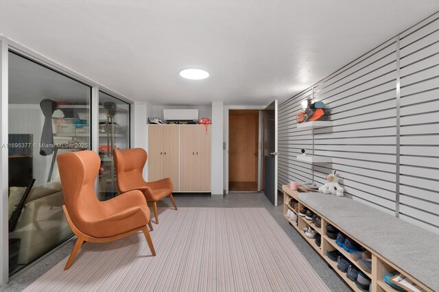 interior space featuring a textured ceiling and concrete floors