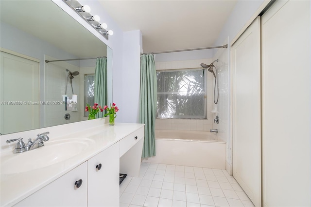 bathroom featuring tile patterned floors, shower / tub combo with curtain, and vanity