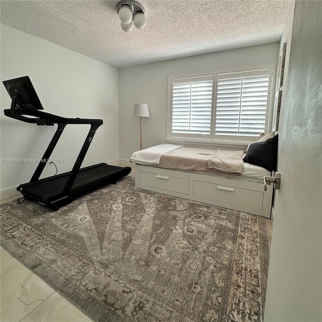 bedroom with a textured ceiling