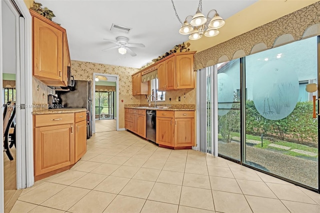 kitchen with dishwasher, light tile patterned floors, ceiling fan with notable chandelier, and plenty of natural light