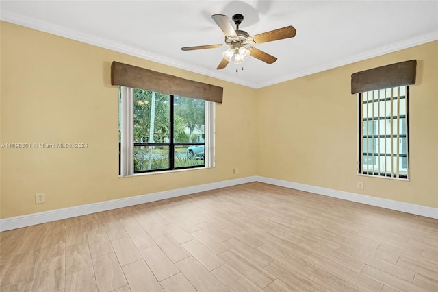 unfurnished room featuring light hardwood / wood-style floors, ceiling fan, and crown molding