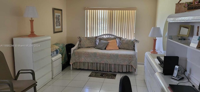 bedroom with light tile patterned floors