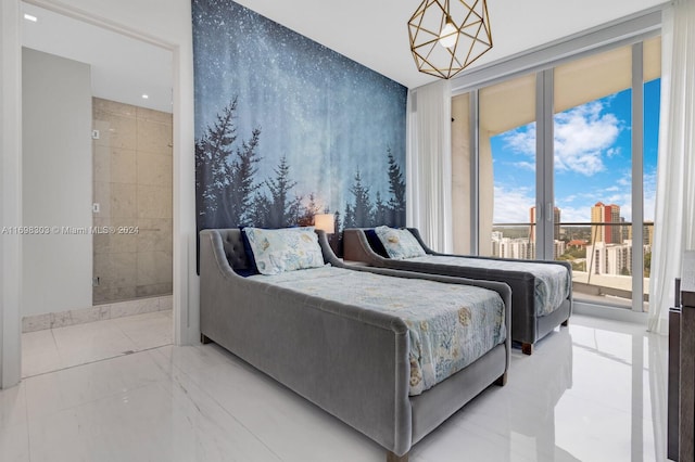 16901 Collins Ave Unit 1402, Sunny Isles Beach, FL 33160 - bedroom with ensuite bath and a chandelier