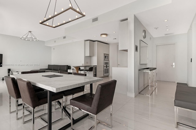 16901 Collins Ave Unit 1402, Sunny Isles Beach, FL 33160 - dining area with recessed lighting and a chandelier
