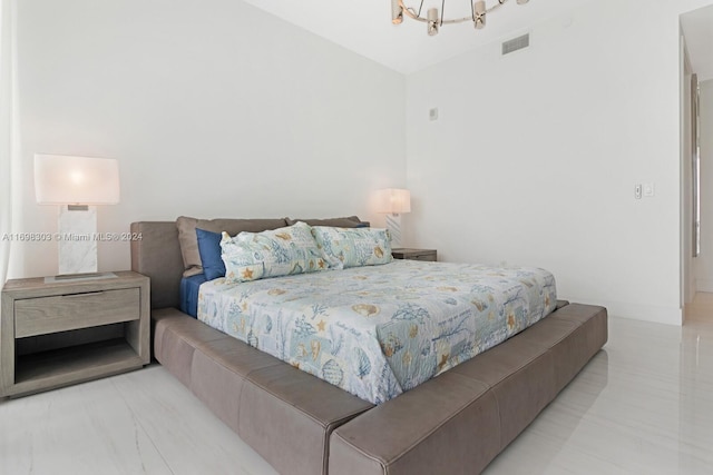 16901 Collins Ave Unit 1402, Sunny Isles Beach, FL 33160 - bedroom featuring a chandelier