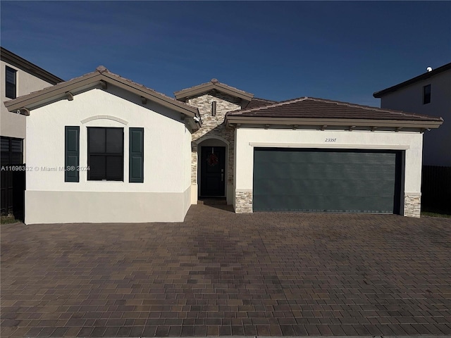 view of front of property featuring a garage