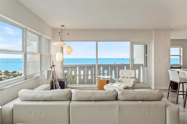 living room featuring a water view