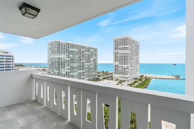 balcony featuring a water view