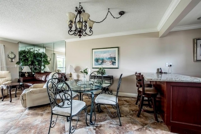 dining space with a chandelier, a textured ceiling, and ornamental molding