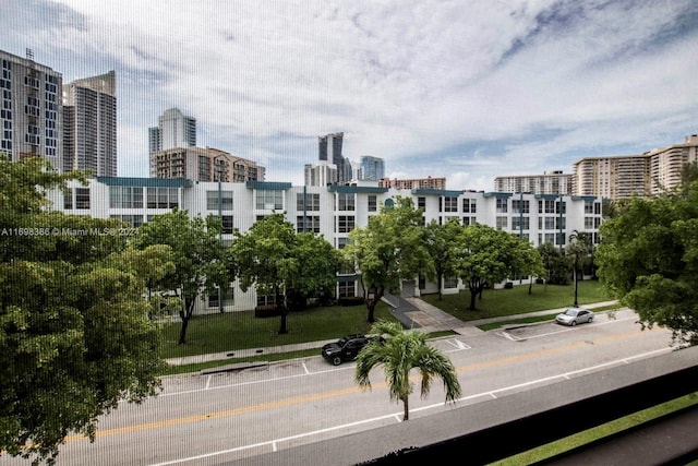 view of community featuring a lawn