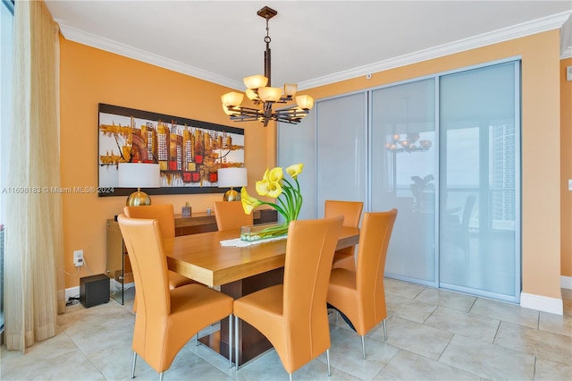 tiled dining space featuring a chandelier and ornamental molding