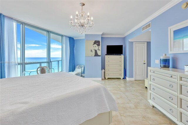 bedroom with a water view, light tile patterned floors, crown molding, and a chandelier