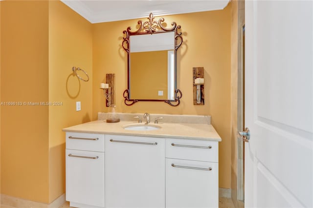 bathroom featuring vanity and ornamental molding