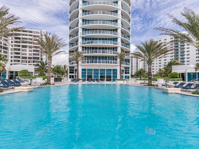 view of swimming pool with a patio