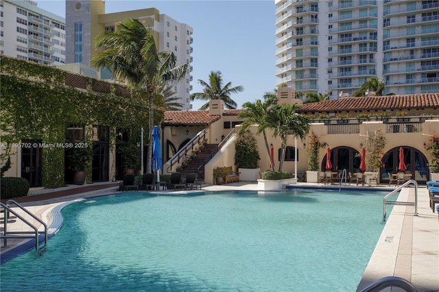 community pool featuring a patio