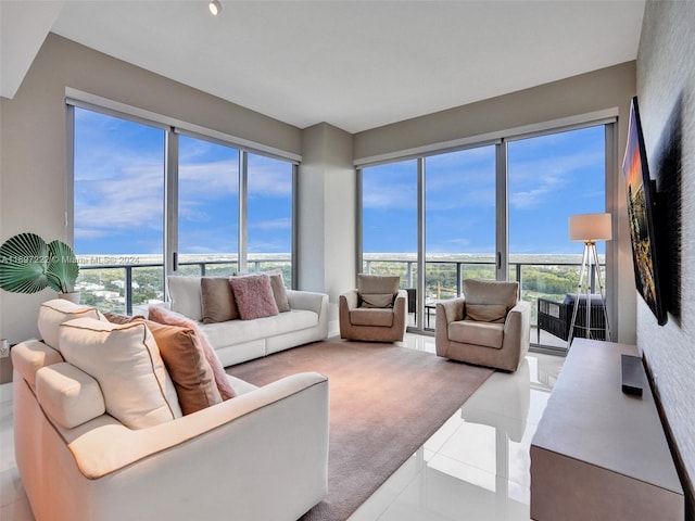 living room with light tile patterned floors and a wealth of natural light