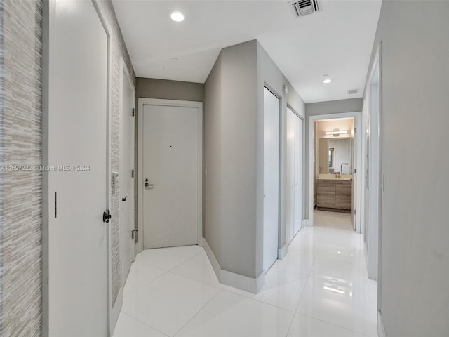 16385 Biscayne Blvd Unit 3201/Lph01, North Miami Beach, FL 33160 - corridor with light tile patterned flooring, baseboards, and recessed lighting