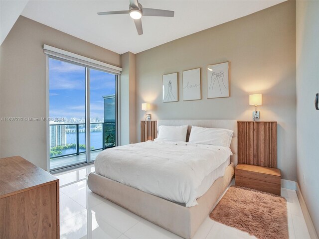 16385 Biscayne Blvd Unit 3201/Lph01, North Miami Beach, FL 33160 - tiled bedroom featuring access to exterior, ceiling fan, and baseboards