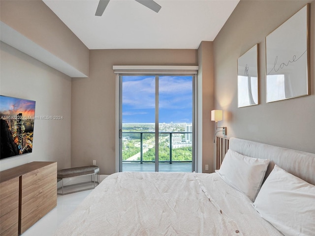 bedroom featuring multiple windows and ceiling fan