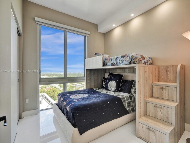 16385 Biscayne Blvd Unit 3201/Lph01, North Miami Beach, FL 33160 - bedroom with tile patterned flooring, multiple windows, recessed lighting, and a water view