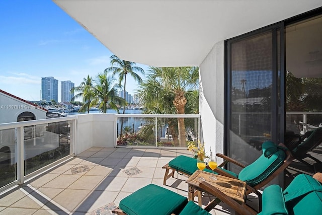 balcony with a city view and a water view