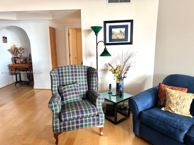 living area with wood-type flooring