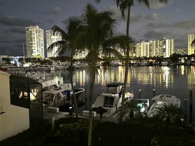 property view of water featuring a dock