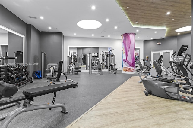 exercise room with visible vents and recessed lighting