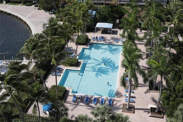 birds eye view of property with a water view