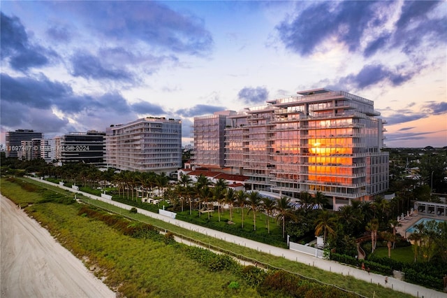 view of outdoor building at dusk