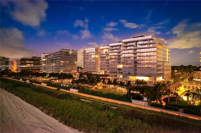 view of outdoor building at dusk