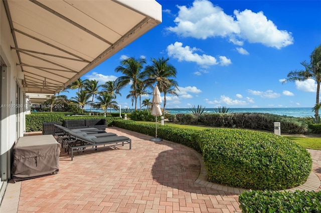 view of patio / terrace with a water view