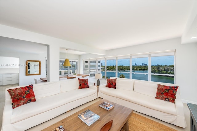 living area featuring a water view