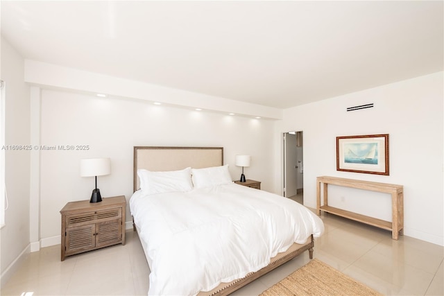bedroom featuring baseboards, light tile patterned floors, and visible vents